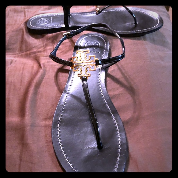 Tory Burch Shoes - Tory Burch Black Sandals with gold emblem! Size 10 Tory Burch Shoes - Tory Burch Black Sandals with gold emblem! Size 10